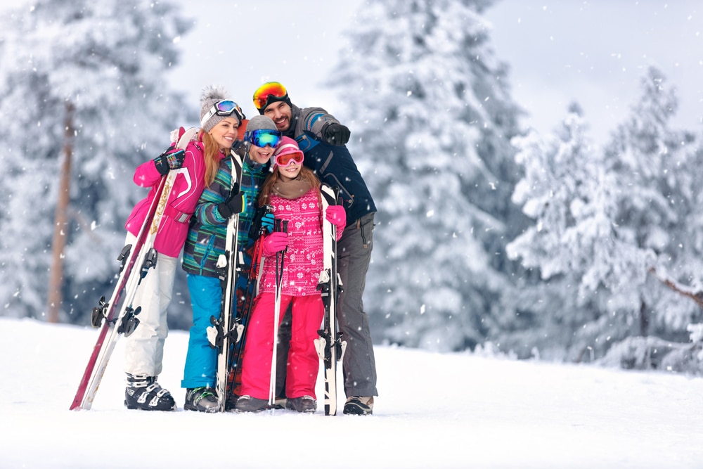 Mount Baker Ski Area, a family playing in the snow and getting ready to ski together 