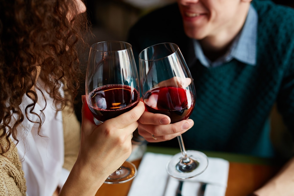 Romantic Getaway in Washington State, couple enjoying a glass of wine