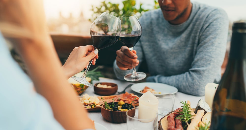 Couple enjoying wine and appetizers at one of the top restaurants in Bellingham